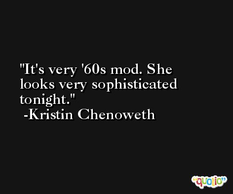 It's very '60s mod. She looks very sophisticated tonight. -Kristin Chenoweth