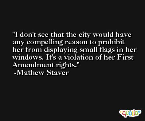 I don't see that the city would have any compelling reason to prohibit her from displaying small flags in her windows. It's a violation of her First Amendment rights. -Mathew Staver